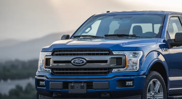 Blue Ford F-150 shown on DJ Walton’s previous website