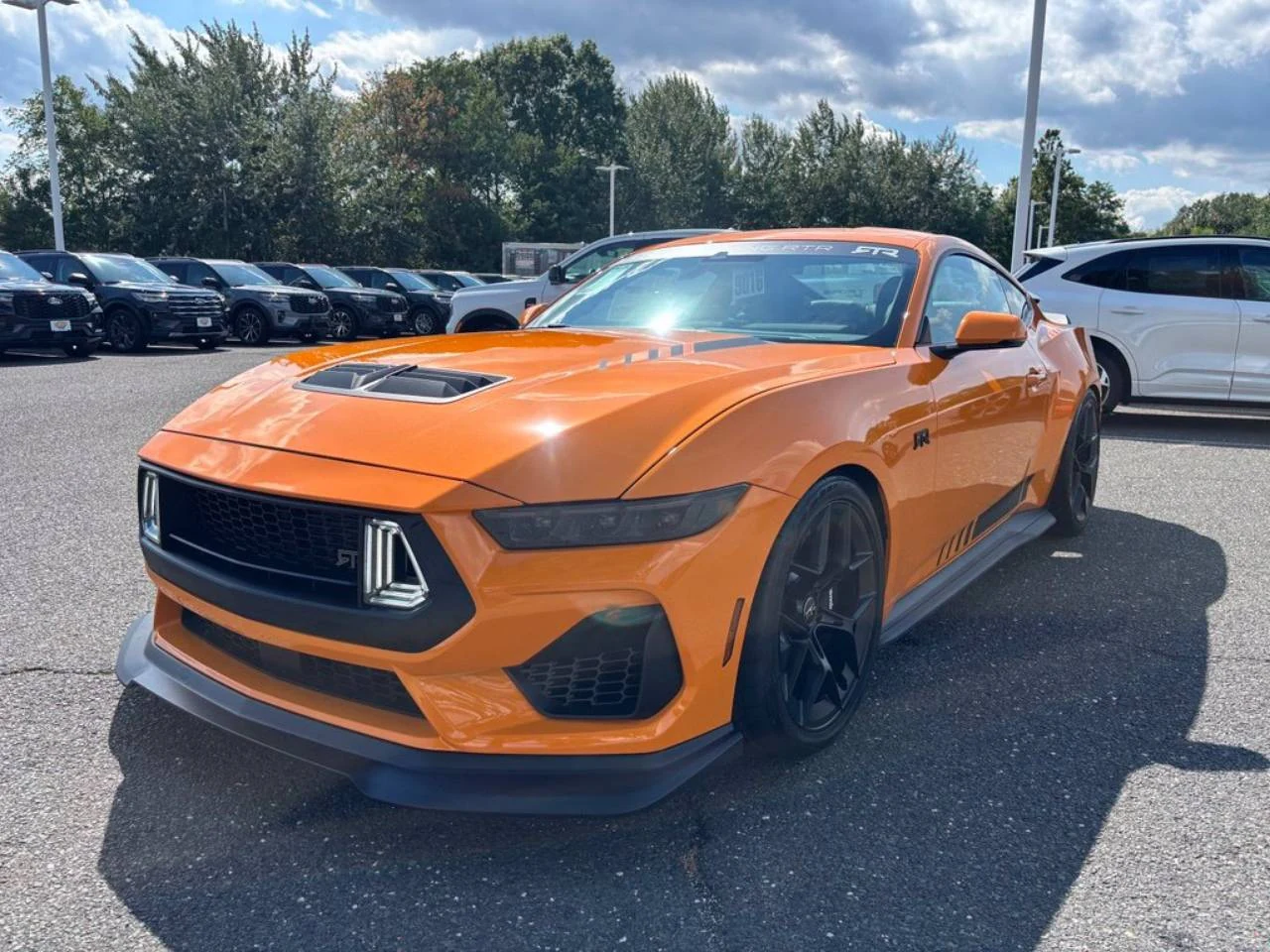 Orange Ford Mustang RTR at the dealership